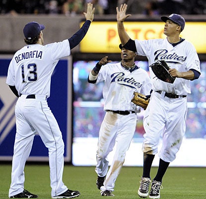 Chris Denorfia, Luis Durango and Will Venable enjoy the shutout victory against the Dodgers. (AP)