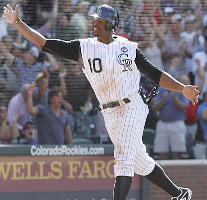Chris Nelson is pumped after stealing home, which is the eventual game-winning run.  (AP)