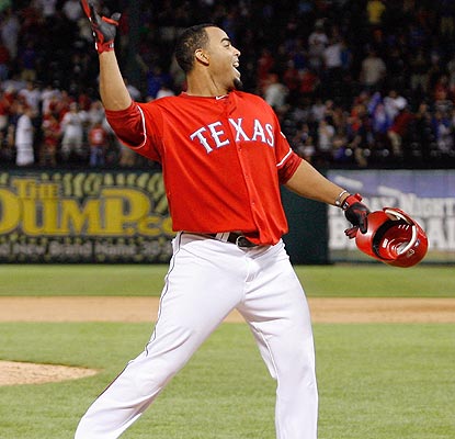 Nelson Cruz sets Arlington on fire when he connects with a Chad Gaudin pitch in the 13th inning. (Getty Images)