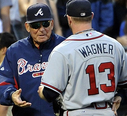 Manager Bobby Cox congratulates Billy Wagner after closing the deal in this game against the Mets. (AP)