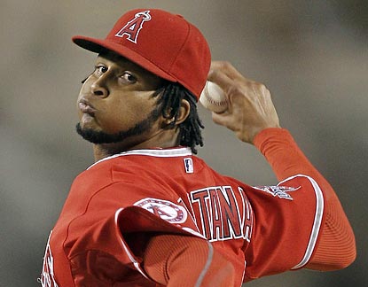 Ervin Santana scatters five singles and strikes out eight in earning his career-high 17th victory.  (AP)