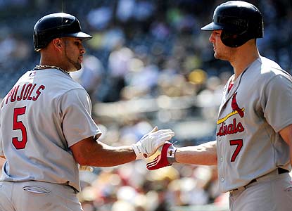 Albert Pujols hits his 40th and 41st  homers while Matt Holliday records his third 100-RBI season for St. Louis. (AP)