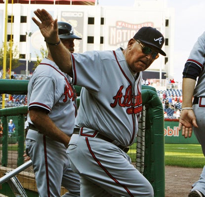 Bobby Cox acknowledges the fans after his team shut out the Nationals to give Cox his 2,500 career victory.  (AP)