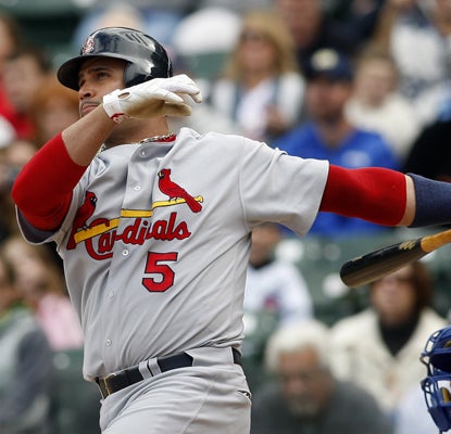 Albert Pujols hits his league-leading 42nd HR -- a three-run shot -- during the first inning against the Cubs. (US Presswire)