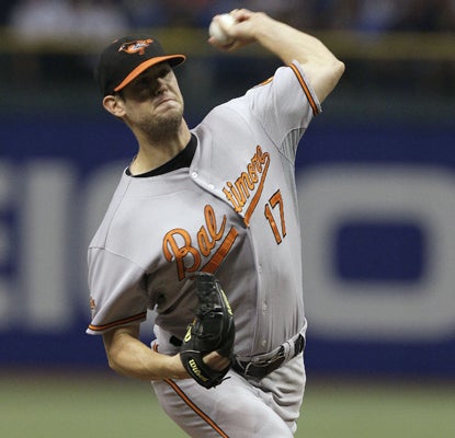 The Orioles' Brian Matusz allows three hits in seven innings with two walks and eight strikeouts.  (AP)