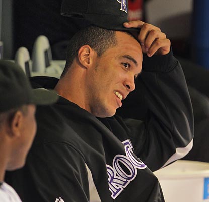 Ubaldo Jimenez is left in dismay as the Dodgers deny him win No. 20, and put the Rockies 4 1/2 back with six to go.  (Getty Images)