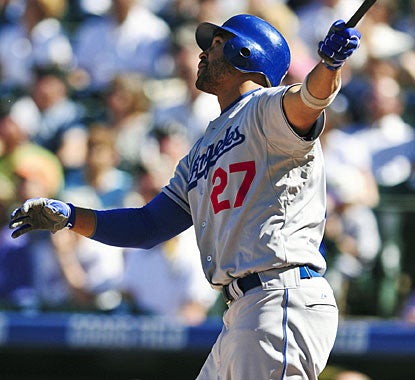 Looks like Matt Kemp knows this swing takes the ball out of the park. And it is, for a grand slam. (US Presswire)