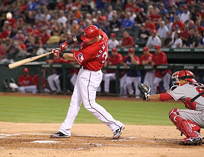 After missing 24 games with broken ribs, Josh Hamilton goes 0 for 3 at the plate. (US Presswire)