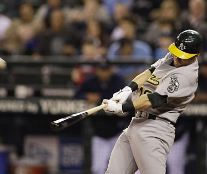 Athletics 1B Daric Barton connects on a pair of home runs -- including a grand slam -- in his first two at-bats.  (AP)