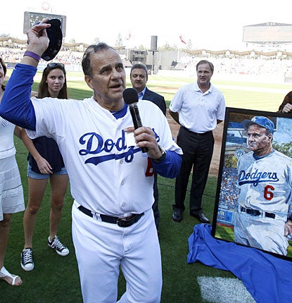 'I guess that last out sort of makes things pretty definite,' Joe Torre says after his final game.  (AP)
