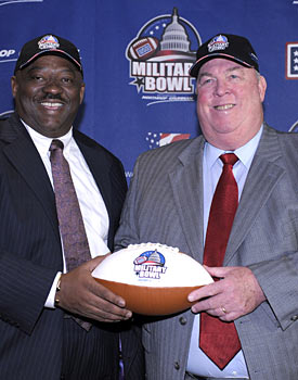 East Carolina coach Ruffin McNeill (left) and Maryland coach Ralph Friedgen face off in the Military Bowl. (AP)