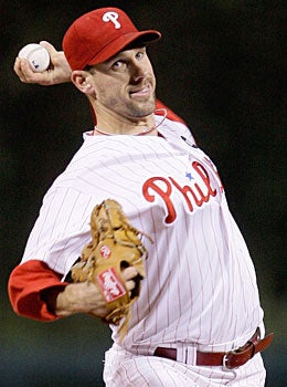 Cliff Lee  returns to the Phillies in hopes of winning one more postseason series than they did in 2009. (Getty Images)