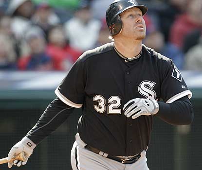 Newcomer Adam Dunn hits a two-run homer in the third to help the White Sox jump out to a 6-0 lead en route to the victory. (AP)