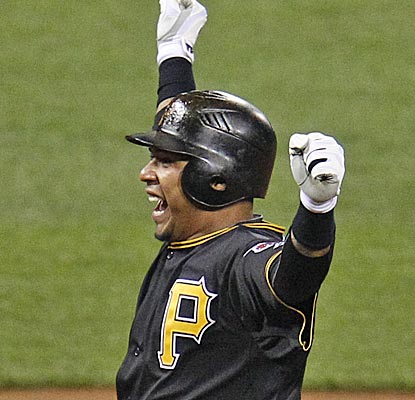 The Pirates' Jose Tabata celebrates after driving in the winning run in the 14th inning with a walk-off double. (AP)