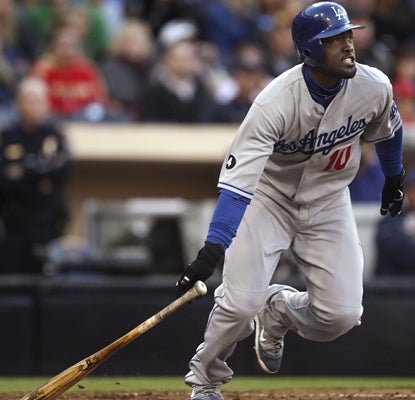 Tony Gwynn Jr. comes back to haunt his old team the Padres with the tie-breaking RBI single in the 11th inning. (AP)