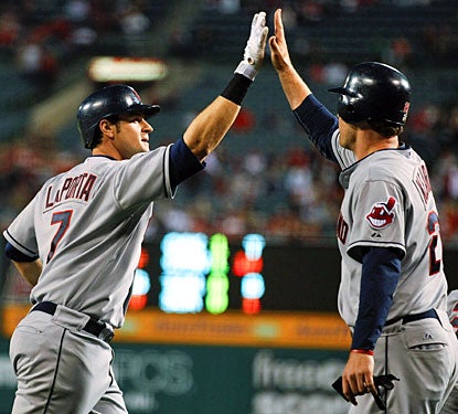 Matt LaPorta (left) celebrates his three-run home run with Austin Kearns in the second inning. (AP)