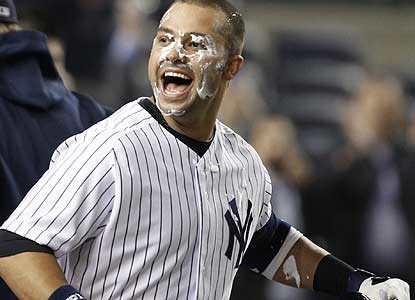 Nick Swisher is the most popular guy in the clubhouse after his sac fly in the 10th caps the Yanks' rally from five runs down. (AP)