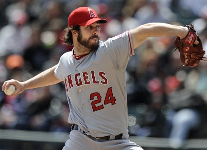 Dan Haren becomes baseball's second four-game winner, along with teammate Jered Weaver, as he strikes out six. (AP)