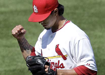Kyle Lohse does a lot of fist-pumping on this day as he records the best outing of his career. (AP)