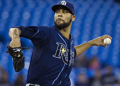 Despite giving up eight hits in eight-plus innings, David Price improves to 7-0 with a 2.30 ERA in eight starts vs. Toronto. (AP)
