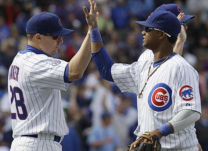 Jeff Baker hits the game winner for the Cubs, who endure seven unanswered Dodgers runs before reeling off five in the eighth. (AP)