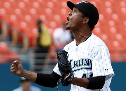 Leo Nunez celebrates earning the save against the Rockies after a dominating performance from starter Josh Johnson. (AP)