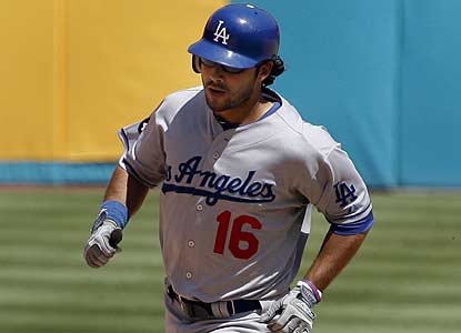 Andre Ethier, who has the major-league record for the longest April hitting streak, bails out L.A. in the 10th with this homer. (AP)