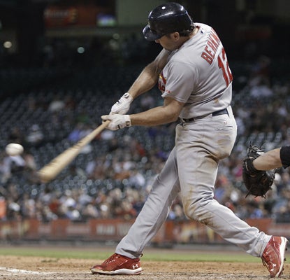 Lance Berkman hits a solo home run in the ninth inning of the Cardinals' win over Astros and contributes five RBI in the game.  (AP)