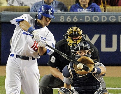 Andre Ethier smacks a single during the eighth inning. Ethier extends his hitting streak to 26 games.  (AP)
