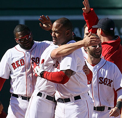 Carrying a .155 BA into Sunday, Carl Crawford celebrates after driving in the game-winning run vs. Seattle. (AP)