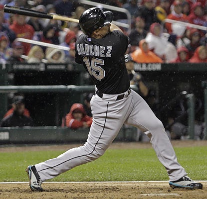 Gaby Sanchez not only puts four runs on the board with this swing, but also ends Kyle Lohse's 22-inning scoreless streak.  (AP)