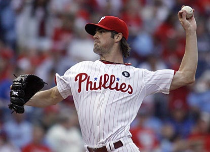 Cole Hamels throws 79 of 108 pitches for strikes, including 25 of 31 first-pitch strikes, and lowers his ERA to 2.66.  (AP)