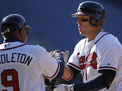 Martin Prado drives in three runs to help the Braves move above .500 (16-15) for the first time since April 5. (AP)