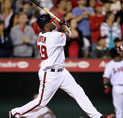 Torii Hunter connects for the game-winning RBI single in the 11th inning to put away the Indians. (AP)