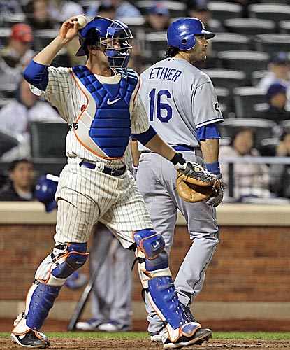 The Dodgers' Andre Ethier walks back to the dugout after striking out in the eighth inning, ending his hit streak at 30 games. (Getty Images)