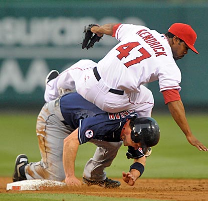 Angels second baseman Howie Kendrick forces out Indians third baseman Jack Hannahan in the third inning. (US Presswire)