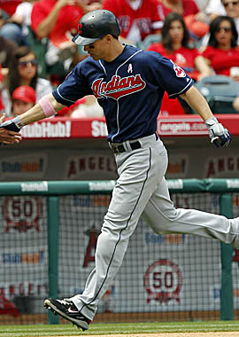 Grady Sizemore rounds third after hitting a solo home run in Cleveland's loss Sunday. (AP)