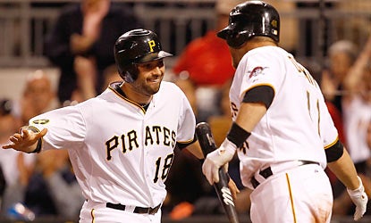 Neil Walker (18) comes up big in the eighth by hitting a tiebreaking double to help the Pirates take the lead for good.  (Getty Images)