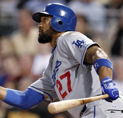 Matt Kemp watches his his sixth-inning homer fly out for three Dodger runs, his seventh blast this season.  (AP)