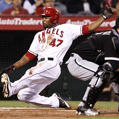 Howard Kendrick scores on a hit by Albert Callaspo to help the Angels finish off the White Sox.  (AP)
