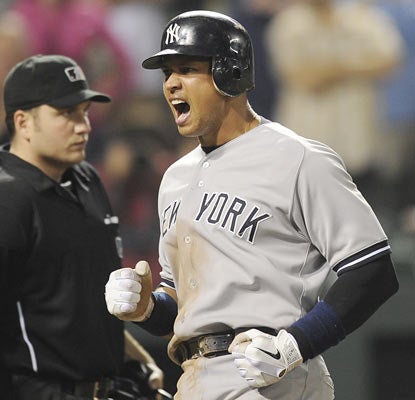Alex Rodriguez, who ties a season-high with four hits, scores twice, including an insurance run in the 15th.  (AP)