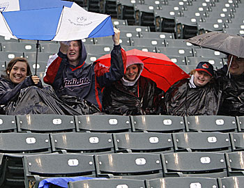 Fans have already soaked up 29 weather-related postponements, eight more than all of last season. (AP)