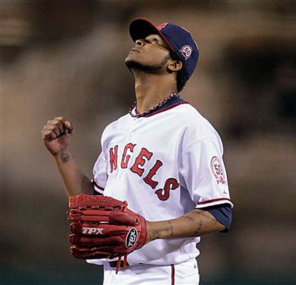 Ervin Santana celebrates his sixth career shutout after holding the Braves to four hits. (AP)