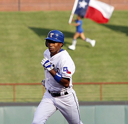 Endy Chavez rounds the bases to complete the back-to-back-to-back home run barrage in the second inning.  (AP)