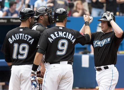 Aaron Hill's (right) first home run since Sept. 29 turns out to be the first grand slam of his career. (AP)