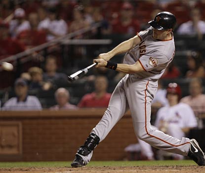 Nate Schierholtz smacks an RBI single in the 11th inning to put the Giants ahead for good in St. Louis.  (AP)