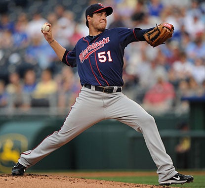 Anthony Swarzak, who started the season in the minors, works six effective innings to earn his first win. (US Presswire)