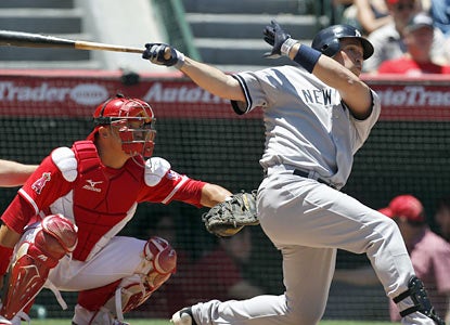 Mark Teixeira hurts his former team by going yard twice. The Yankees 1B finishes with three hits and three RBI. (AP)