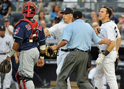 The game nearly takes an ugly turn after Fausto Carmona hits batter Mark Teixeira. Benches clear but no one is ejected.  (Getty Images)