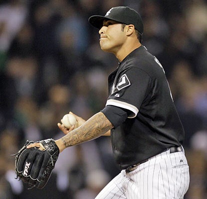 Sergio Santos implodes one strike away from securing a W in the ninth by allowing two hits, three walks and four earned runs.  (AP)